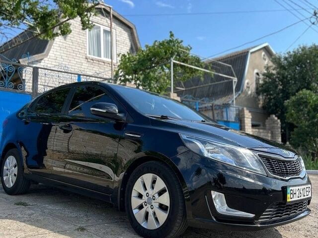 Чорний Кіа Ріо, об'ємом двигуна 1.59 л та пробігом 87 тис. км за 9499 $, фото 2 на Automoto.ua