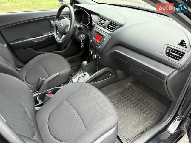 Чорний Кіа Ріо, об'ємом двигуна 1.4 л та пробігом 45 тис. км за 9800 $, фото 21 на Automoto.ua