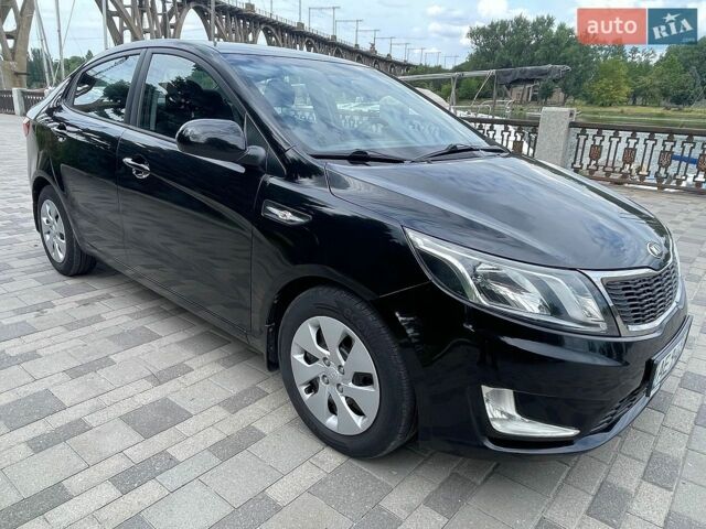 Черный Киа Рио, объемом двигателя 1.4 л и пробегом 89 тыс. км за 8300 $, фото 8 на Automoto.ua