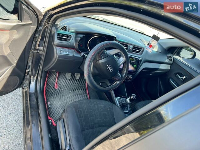 Чорний Кіа Ріо, об'ємом двигуна 1.6 л та пробігом 142 тис. км за 6800 $, фото 6 на Automoto.ua