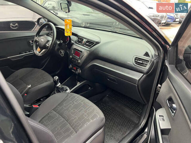 Черный Киа Рио, объемом двигателя 1.6 л и пробегом 170 тыс. км за 7999 $, фото 13 на Automoto.ua