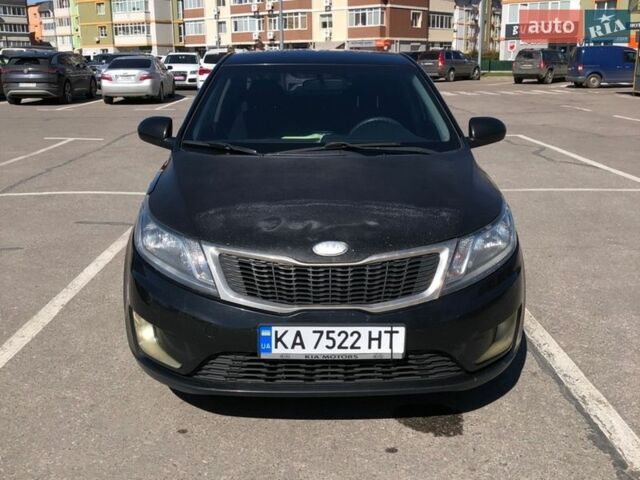 Чорний Кіа Ріо, об'ємом двигуна 1.4 л та пробігом 177 тис. км за 6800 $, фото 1 на Automoto.ua