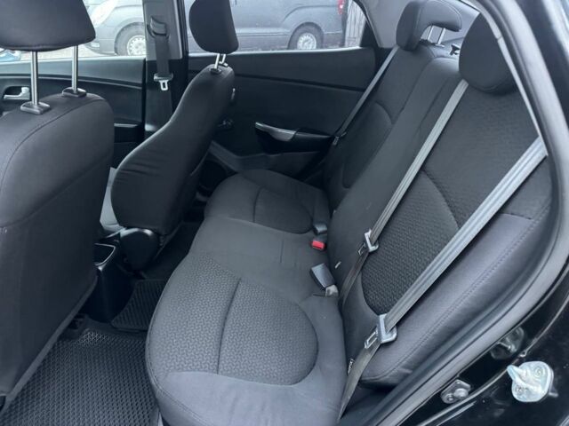 Чорний Кіа Ріо, об'ємом двигуна 1.4 л та пробігом 214 тис. км за 7700 $, фото 14 на Automoto.ua