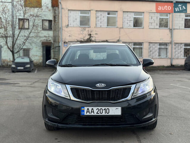 Черный Киа Рио, объемом двигателя 1.4 л и пробегом 305 тыс. км за 4950 $, фото 2 на Automoto.ua