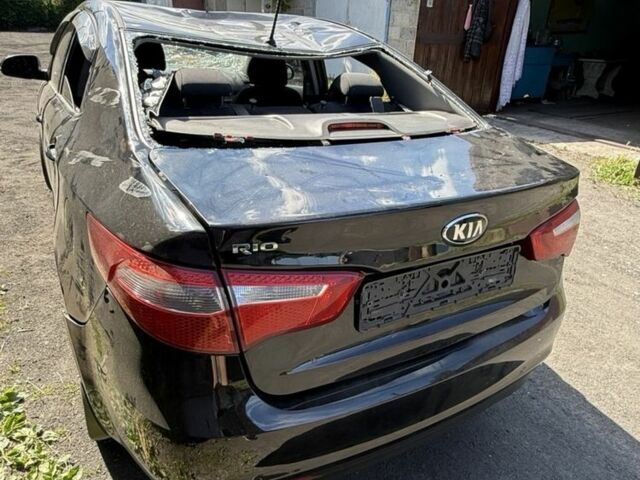 Чорний Кіа Ріо, об'ємом двигуна 1.6 л та пробігом 195 тис. км за 3999 $, фото 1 на Automoto.ua