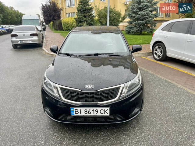 Чорний Кіа Ріо, об'ємом двигуна 1.4 л та пробігом 136 тис. км за 7950 $, фото 2 на Automoto.ua