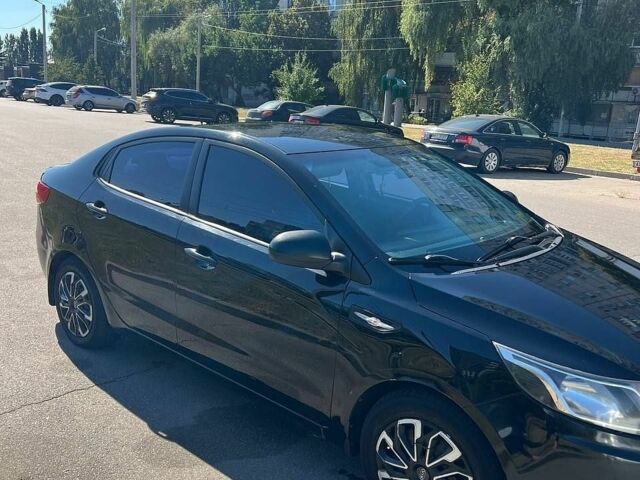 Черный Киа Рио, объемом двигателя 1.4 л и пробегом 200 тыс. км за 6500 $, фото 7 на Automoto.ua