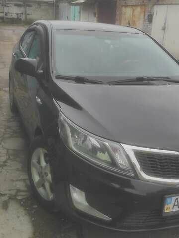 Черный Киа Рио, объемом двигателя 1.4 л и пробегом 120 тыс. км за 8500 $, фото 5 на Automoto.ua