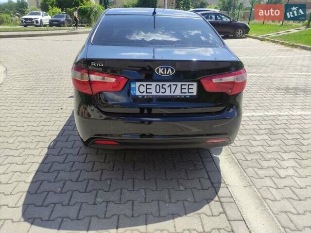 Чорний Кіа Ріо, об'ємом двигуна 1.4 л та пробігом 186 тис. км за 6800 $, фото 1 на Automoto.ua