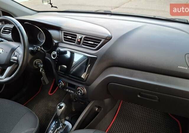 Черный Киа Рио, объемом двигателя 1.6 л и пробегом 130 тыс. км за 8750 $, фото 20 на Automoto.ua