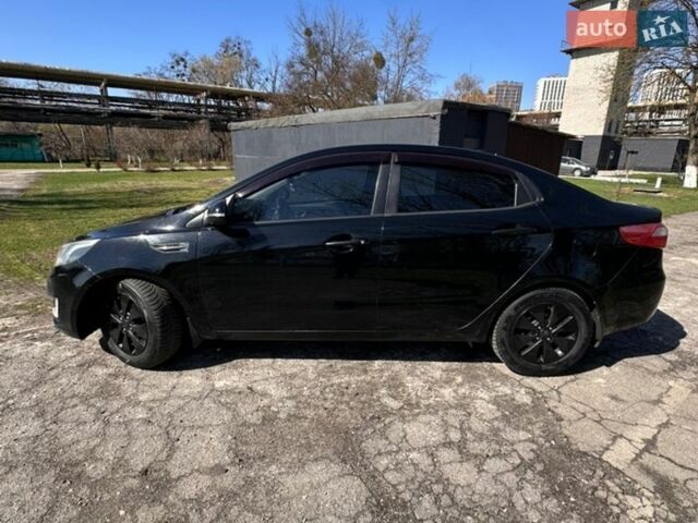Чорний Кіа Ріо, об'ємом двигуна 1.59 л та пробігом 329 тис. км за 6000 $, фото 6 на Automoto.ua