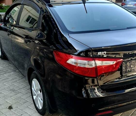 Черный Киа Рио, объемом двигателя 1.6 л и пробегом 130 тыс. км за 8750 $, фото 15 на Automoto.ua