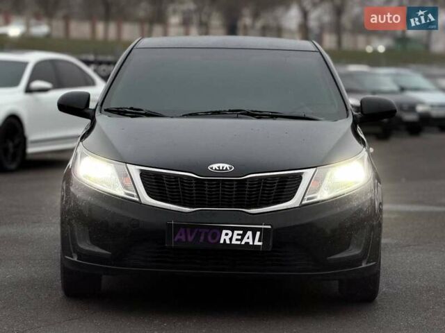Черный Киа Рио, объемом двигателя 1.4 л и пробегом 220 тыс. км за 8200 $, фото 5 на Automoto.ua