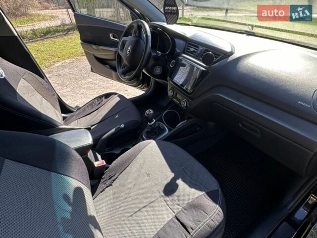 Чорний Кіа Ріо, об'ємом двигуна 1.59 л та пробігом 329 тис. км за 6000 $, фото 13 на Automoto.ua