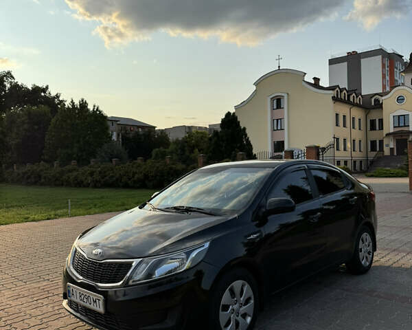 Черный Киа Рио, объемом двигателя 1.4 л и пробегом 183 тыс. км за 7000 $, фото 7 на Automoto.ua