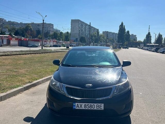 Черный Киа Рио, объемом двигателя 1.4 л и пробегом 200 тыс. км за 6500 $, фото 3 на Automoto.ua