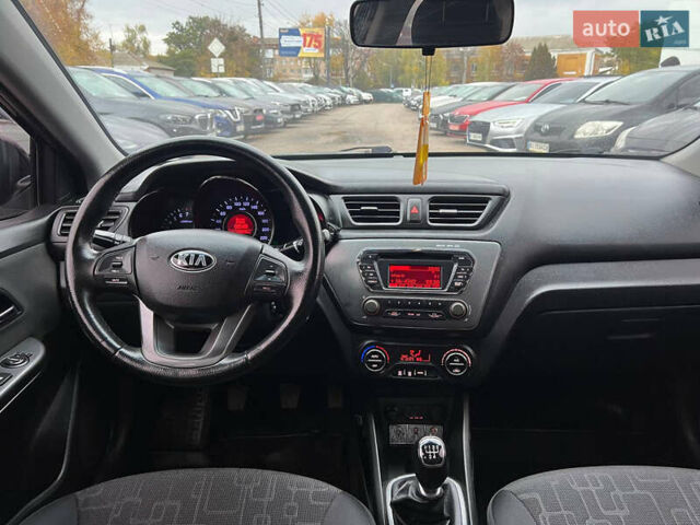 Черный Киа Рио, объемом двигателя 1.6 л и пробегом 170 тыс. км за 7999 $, фото 14 на Automoto.ua