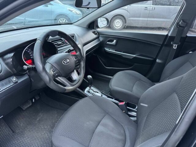 Черный Киа Рио, объемом двигателя 1.4 л и пробегом 214 тыс. км за 7700 $, фото 6 на Automoto.ua