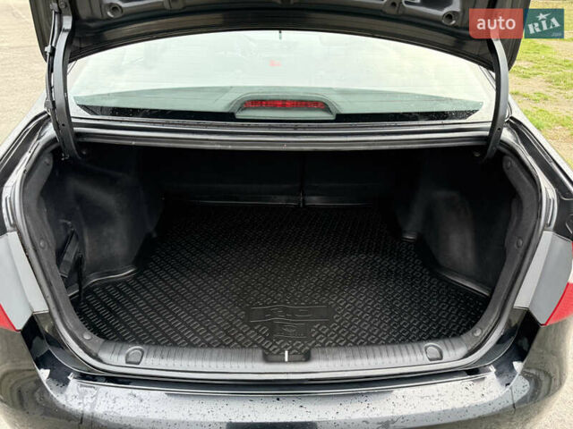 Чорний Кіа Ріо, об'ємом двигуна 1.4 л та пробігом 45 тис. км за 9800 $, фото 28 на Automoto.ua