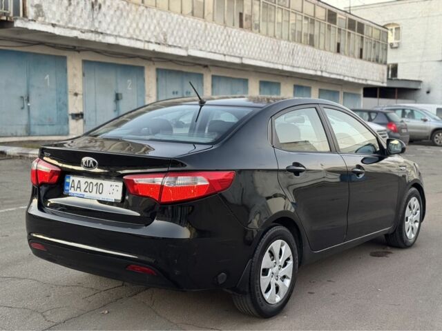 Черный Киа Рио, объемом двигателя 1.4 л и пробегом 305 тыс. км за 4750 $, фото 3 на Automoto.ua