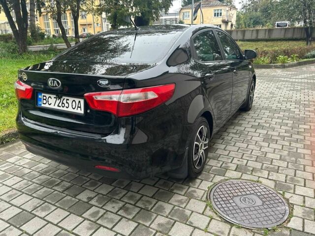 Черный Киа Рио, объемом двигателя 1.4 л и пробегом 141 тыс. км за 7200 $, фото 7 на Automoto.ua