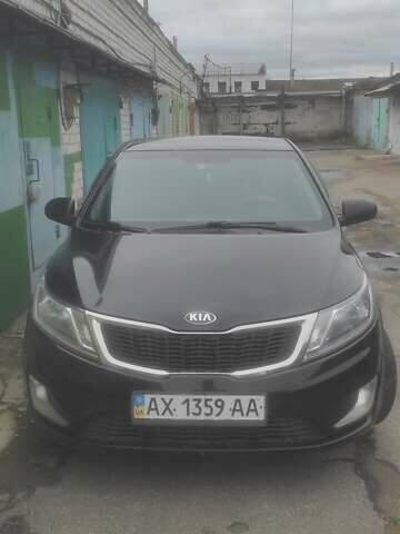 Черный Киа Рио, объемом двигателя 1.4 л и пробегом 120 тыс. км за 8500 $, фото 1 на Automoto.ua