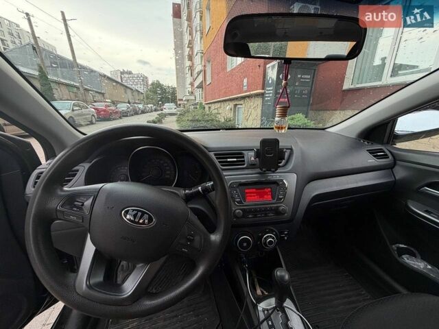 Чорний Кіа Ріо, об'ємом двигуна 1.4 л та пробігом 87 тис. км за 7700 $, фото 13 на Automoto.ua
