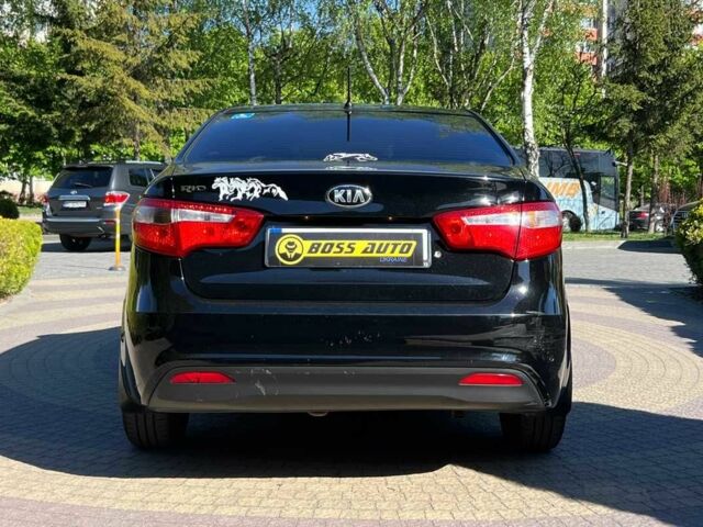 Черный Киа Рио, объемом двигателя 1.4 л и пробегом 215 тыс. км за 6999 $, фото 5 на Automoto.ua