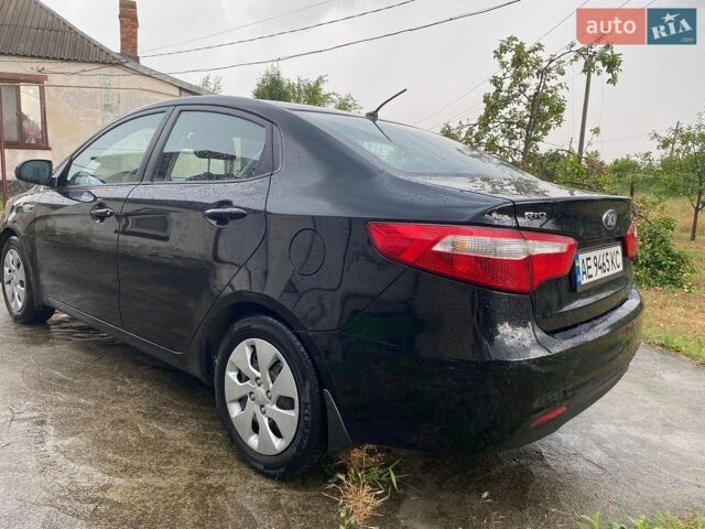 Чорний Кіа Ріо, об'ємом двигуна 1.4 л та пробігом 88 тис. км за 8300 $, фото 6 на Automoto.ua