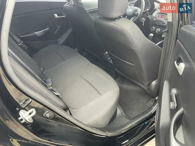 Черный Киа Рио, объемом двигателя 1.4 л и пробегом 136 тыс. км за 7700 $, фото 32 на Automoto.ua
