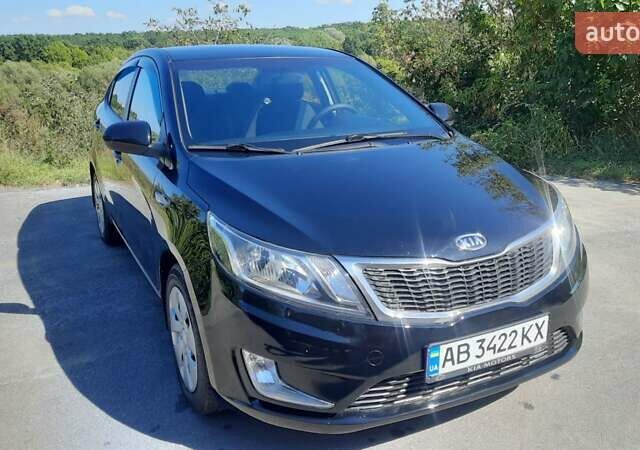 Черный Киа Рио, объемом двигателя 1.4 л и пробегом 121 тыс. км за 8600 $, фото 5 на Automoto.ua