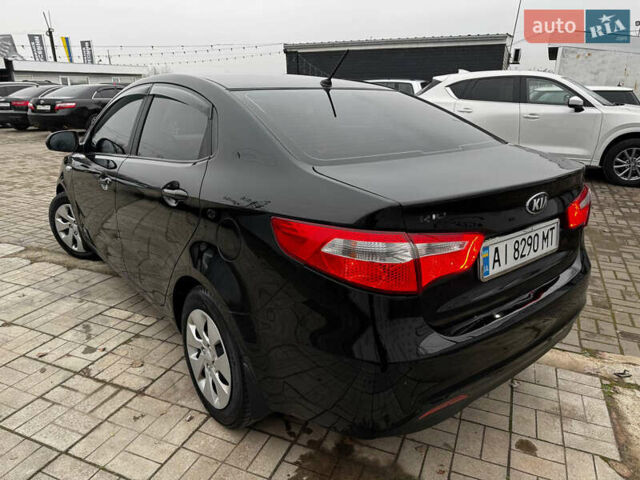 Черный Киа Рио, объемом двигателя 1.4 л и пробегом 185 тыс. км за 6999 $, фото 2 на Automoto.ua