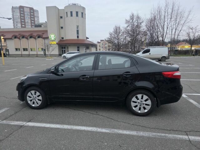 Черный Киа Рио, объемом двигателя 1.6 л и пробегом 150 тыс. км за 9000 $, фото 3 на Automoto.ua