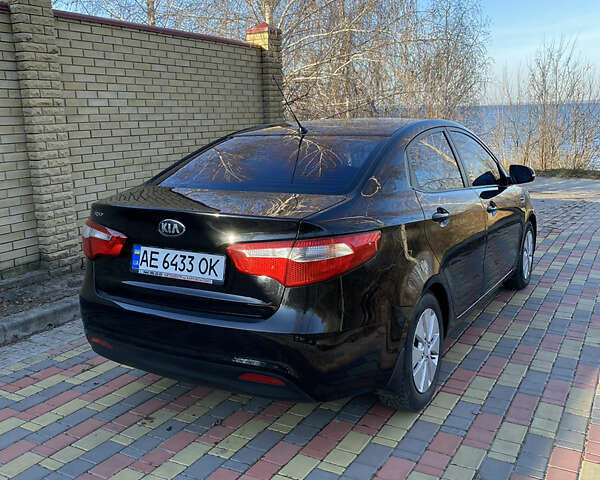 Черный Киа Рио, объемом двигателя 1.6 л и пробегом 170 тыс. км за 8600 $, фото 2 на Automoto.ua
