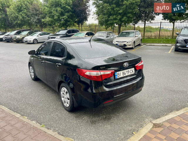 Чорний Кіа Ріо, об'ємом двигуна 1.4 л та пробігом 136 тис. км за 7950 $, фото 7 на Automoto.ua
