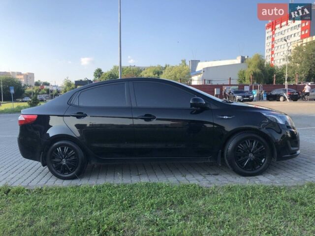 Чорний Кіа Ріо, об'ємом двигуна 1.4 л та пробігом 92 тис. км за 10000 $, фото 3 на Automoto.ua