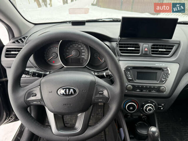 Чорний Кіа Ріо, об'ємом двигуна 1.4 л та пробігом 123 тис. км за 7300 $, фото 17 на Automoto.ua