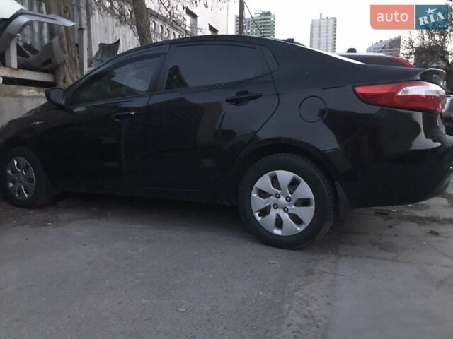 Черный Киа Рио, объемом двигателя 1.4 л и пробегом 102 тыс. км за 2600 $, фото 1 на Automoto.ua