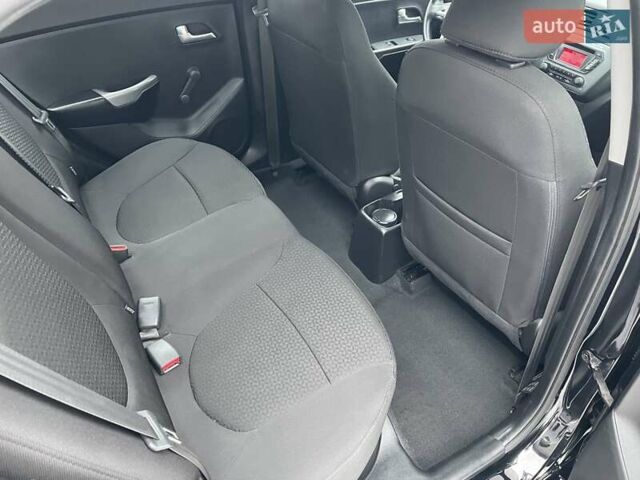 Черный Киа Рио, объемом двигателя 1.4 л и пробегом 124 тыс. км за 9350 $, фото 123 на Automoto.ua