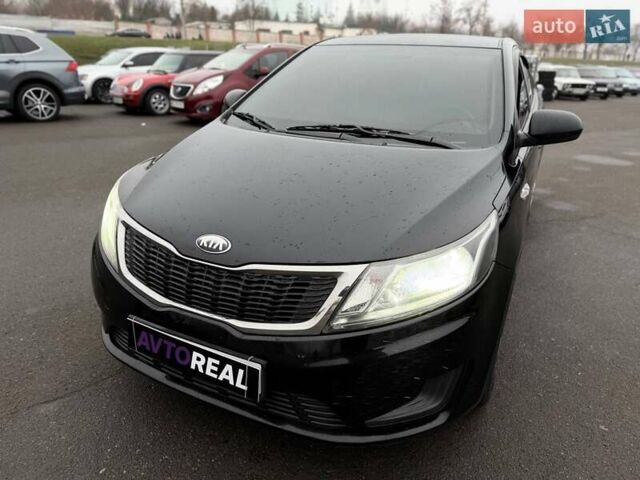 Черный Киа Рио, объемом двигателя 1.4 л и пробегом 220 тыс. км за 8200 $, фото 10 на Automoto.ua