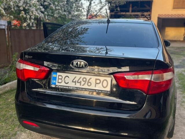 Черный Киа Рио, объемом двигателя 1.4 л и пробегом 160 тыс. км за 7600 $, фото 2 на Automoto.ua