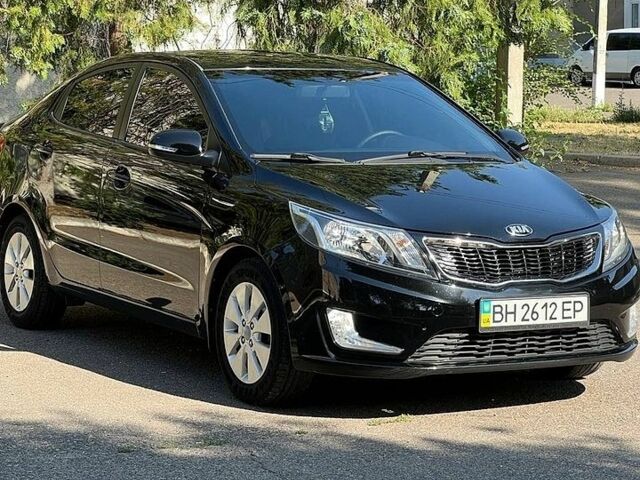 Черный Киа Рио, объемом двигателя 1.59 л и пробегом 87 тыс. км за 9500 $, фото 1 на Automoto.ua