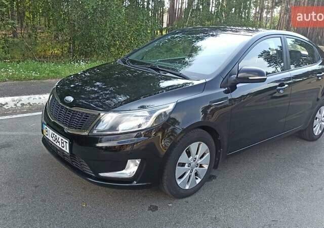Черный Киа Рио, объемом двигателя 1.59 л и пробегом 150 тыс. км за 8300 $, фото 1 на Automoto.ua