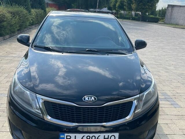 Черный Киа Рио, объемом двигателя 1.4 л и пробегом 247 тыс. км за 7800 $, фото 6 на Automoto.ua