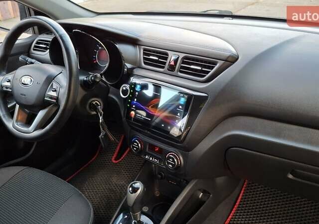 Черный Киа Рио, объемом двигателя 1.6 л и пробегом 130 тыс. км за 8750 $, фото 22 на Automoto.ua