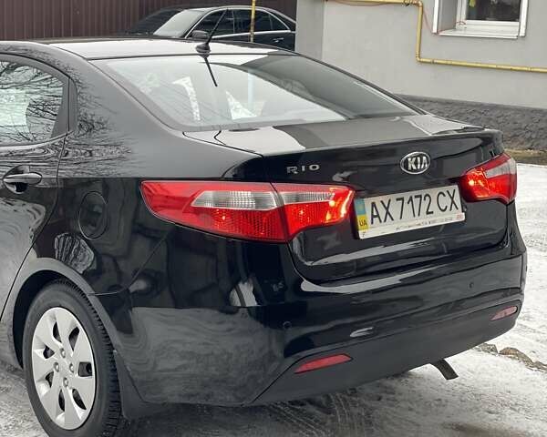 Черный Киа Рио, объемом двигателя 1.4 л и пробегом 124 тыс. км за 9350 $, фото 48 на Automoto.ua