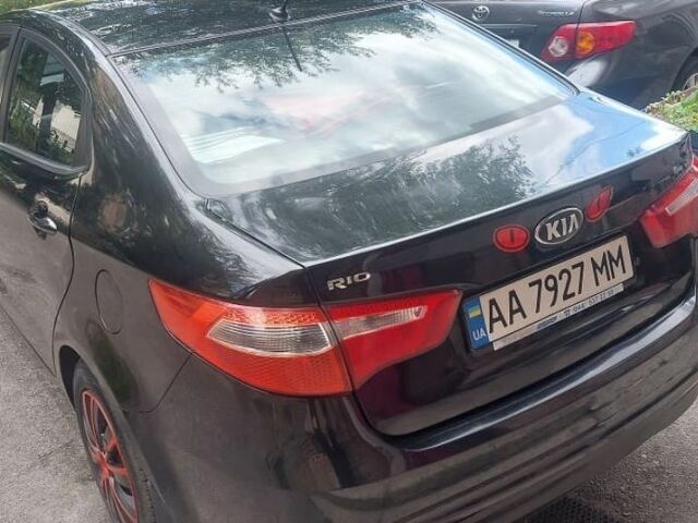 Черный Киа Рио, объемом двигателя 1.4 л и пробегом 320 тыс. км за 6200 $, фото 3 на Automoto.ua
