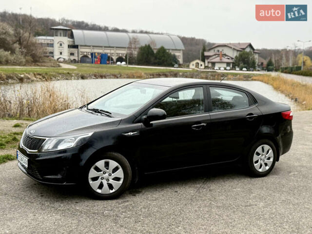 Чорний Кіа Ріо, об'ємом двигуна 1.4 л та пробігом 45 тис. км за 9800 $, фото 11 на Automoto.ua