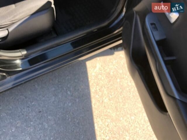 Чорний Кіа Ріо, об'ємом двигуна 1.4 л та пробігом 177 тис. км за 6800 $, фото 13 на Automoto.ua