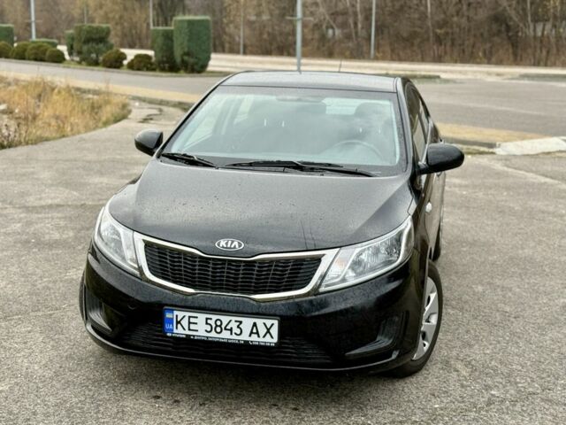 Чорний Кіа Ріо, об'ємом двигуна 1.4 л та пробігом 45 тис. км за 9800 $, фото 1 на Automoto.ua